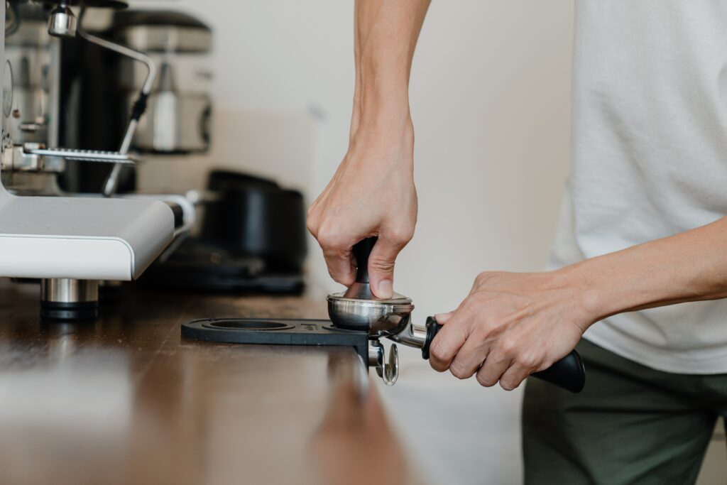 Barista making coffee